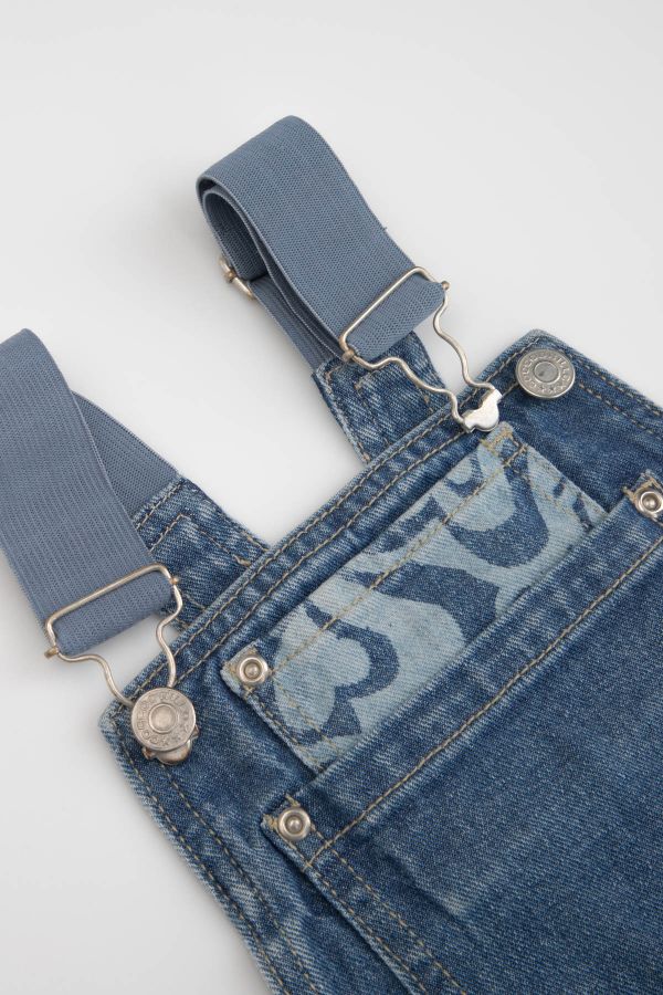 Spodnie jeansowe niebieskie ogrodniczki z kieszeniami 2221998