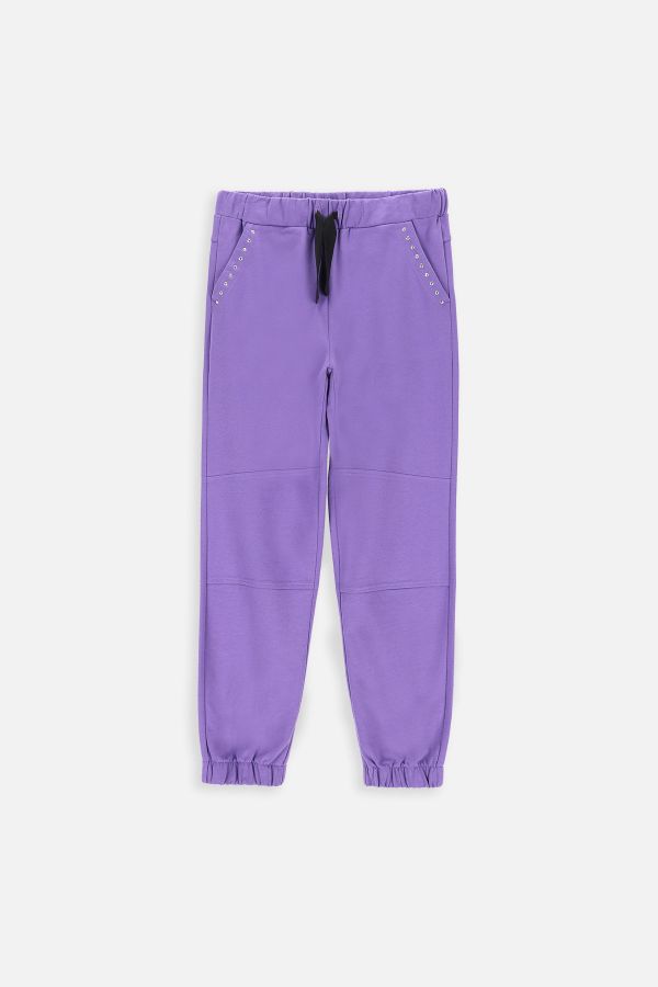 Spodnie dresowe fioletowe z kieszeniami i przeszyciami na nogawkach 2220089