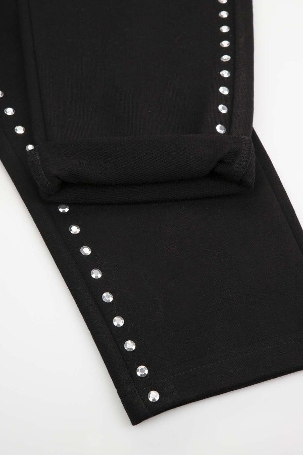 Spodnie dresowe czarne z ozdobnymi lampasami 2218528
