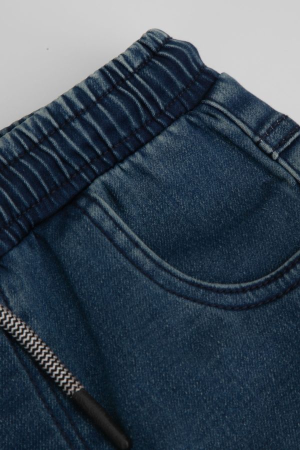 Spodnie jeansowe granatowe joggery z kieszeniami o fasonie REGULAR 2220702