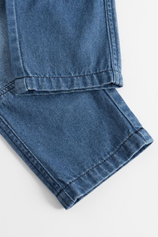 Spodnie jeansowe długie w kolorze niebieskim 2148108