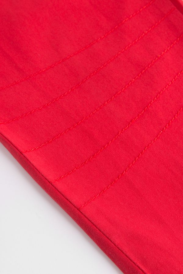 Spodnie tkaninowe w kolorze czerwonym z kieszonką na nogawce 2148124