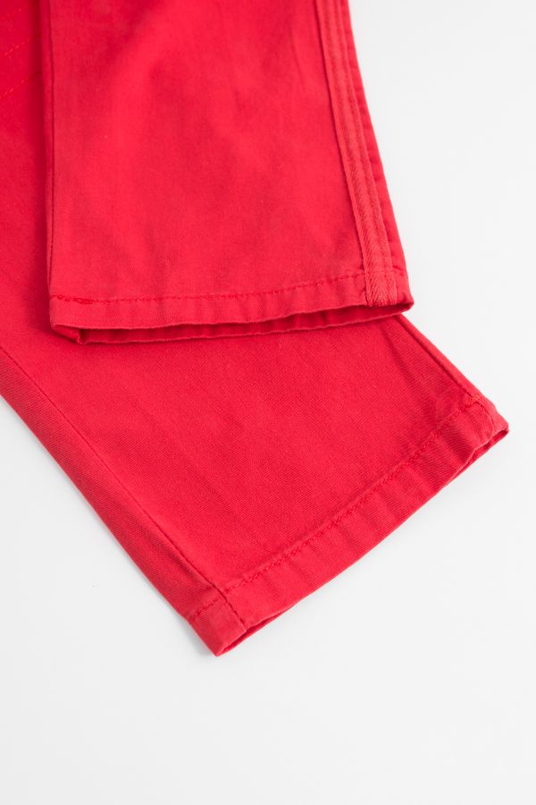 Spodnie tkaninowe w kolorze czerwonym z kieszonką na nogawce 2148125