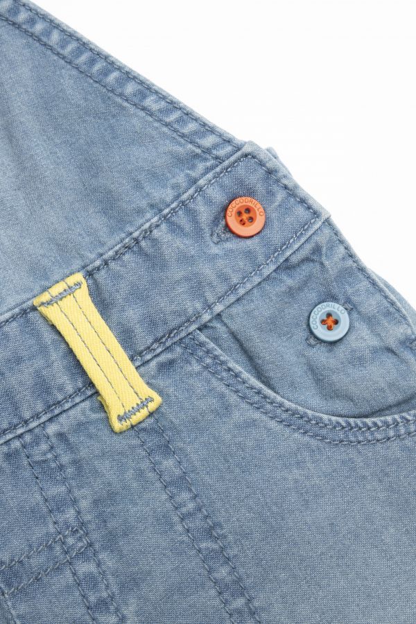 Spodnie jeansowe ogrodniczki z kolorowymi guzikami 2155310