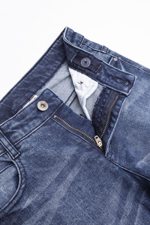 Spodnie jeansowe z efektem sprania i ozdobnymi przetarciami o fasonie SLIM 2194096