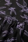 Sukienka dzianinowa z krótkim rękawem LOONEY TUNES czarna rozkloszowana z nadrukiem - Królik Bugs 2224813