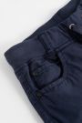 Spodnie tkaninowe spodnie w kolorze granatowym wiązane w pasie 2148081
