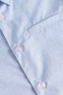 Koszula z krótkim rękawem z kołnierzykiem w kolorze niebieskim z nadrukiem 2150460