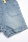 Spodnie jeansowe ogrodniczki z kolorowymi guzikami 2155311