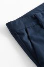 Spodnie tkaninowe eleganckie spodnie garniturowe granatowe z kantem i zaszewkami 2155398