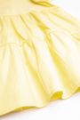 Sukienka z łączonych tkanin żółta z falbanami i napisem z przodu 2157397