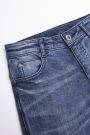 Spodnie jeansowe z efektem sprania i ozdobnymi przetarciami o fasonie SLIM 2194095