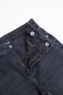 Spodnie jeansowe z efektem sprania i strzępioną nogawką o fasonie SLIM 2194111