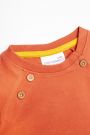 T-shirt z długim rękawem w kolorze pomarańczowym z nadrukami i ozdobnymi guzikami 2196154