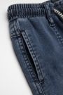 Spodnie jeansowe granatowe z wiązaniem w pasie o fasonie SLIM 2112682